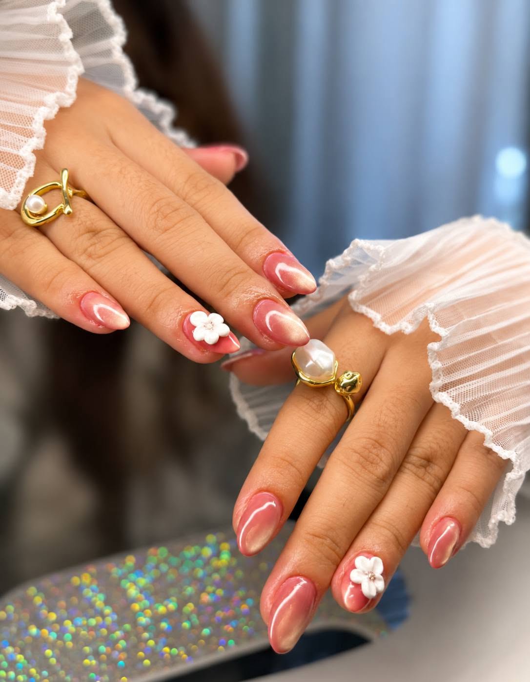 Pink pearl manicure with artisan Japanese floral nail art